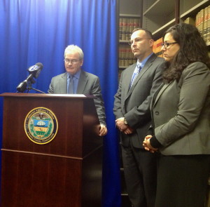 Chief Deputy District Attorney Patrick Carmody (left), with West Goshen Det. David Maurer and Assistant District Attorney Deborah S. Ryan, speaks to reporters after Morgan M. Mengel’s sentencing.