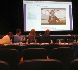 Members of the school board view a preview of a web site created by Kirsten Sharp, a Kennett High junior, to make eighth-graders feel more comfortable about entering the high school.