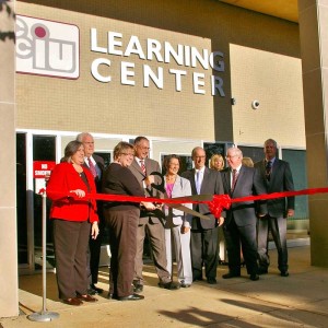 Chester County Intermediate Unit administrators and various dignitaries including Chester County Commissioner Kathi Cozzone, State Representatives Tim Hennsessey, Becky Cornbin and Chris Ross joined district officials to cut the ribbon at the new Learning Center, Wednesday.