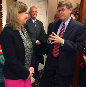 Former Chester County District Attorney Joseph W. Carroll (right), now a Crime Victims’ Center board member, tells Elizabeth B. Pitts why she was selected to receive the 2013 John J. Crane Award as attorney Dawson R. “Rich” Muth smiles in agreement.