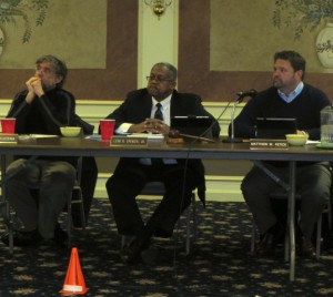Borough Manager Brant Kucera (from left), Council President Leon Spencer, and Mayor Matt Fetick listen as residents air their concerns.