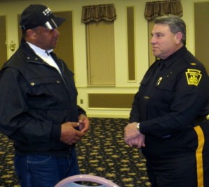 Resident Robert Whiteside chats with Kennett Square Police Chief Edward A. Zunino after Wednesday night's public forum.