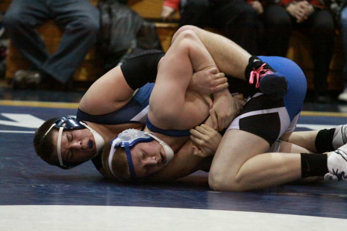 Cory Tomasetti delivered a pin at the 1:32 mark of the 220 pound battle.