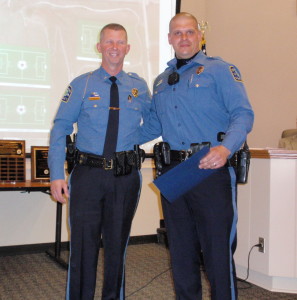 New Garden Police Officer Joseph P. Versagli 3rd (right) received a commendation from Police Chief Gerald R. Simpson for his DUI enforcement.