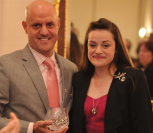 Rich Yoegel, co-chair of the American Red Cross Chester County Leadership Council, presents the Heroes bowl to Jessica Good, the widow of Chris Good, who was honored posthumously for his years of bravery and community service. Photo by Alex Greenblatt