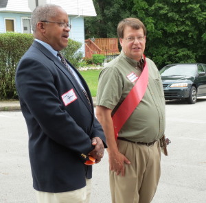 Borough Council Member Leon Spence chats with Ethan Cramer, during a recent celebration on East Linden Street.