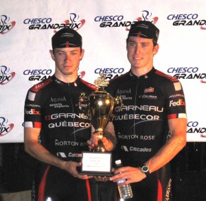 Individual winner Adam Farabaugh (right) and runner-up Zach Hughs hold their Garneau-Quebecor overall team trophy.