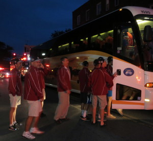 KAU coaches and players get back on the bus after walking a couple of blocks so they could interact with the fans that lined State Street.