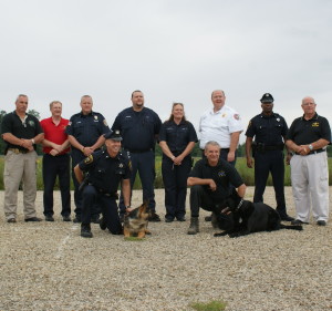 At the Flight 93 Memorial, the first-responders were Shane Clark (from left, back row), Ron Miller, Jack Law, Jim Werner, Penny Knotts, Beau Crowding, William Carter, Ed Toner, Mark Smith (bottom row, left) and his K-9, Jake, and John DiBuonaventuro and his K-9 partner, Leo.