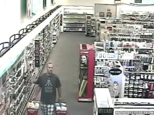 Surveillance video captured the suspect with two baskets full of baby formula that he stole, police said.