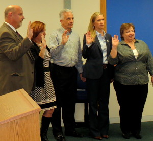 Taking to oath of office as school directors during the KCSD meeting  are Douglas B Stirling (from left), Kendra LaCosta, Joseph Meola, Heather Schaen, and Janis W. Reynolds.