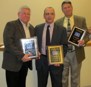 New Garden Township awards plaques of appreciation to three outgoing supervisors: Robert Perrotti (from left), Peter Scilla, and Bob Norris.