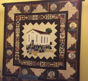 The centerpiece of a new quilt for the Chester County Conference and Visitors Bureau was inspired by a historic photograph of what was once the Longwood Progressive Meeting, a hub for abolitionists.