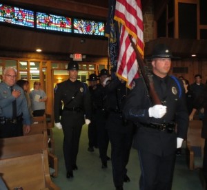 Members of the West Goshen Township Police Department Honor Guard file into Central Presbyterian Church in Downingtown.