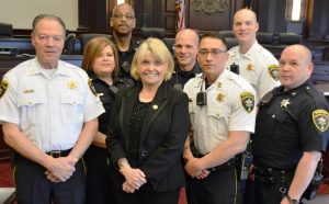 From left, Chester County Sheriff’s Office Chief Deputy George March, Sergeant Janis Pickell, Corporal Wayne Johnson, Sheriff Carolyn Bunny Welsh, Corporal Brad DeSando, Captain Jason Suydam, Lieutenant Adam Sibley and Corporal Robert Buckley.
